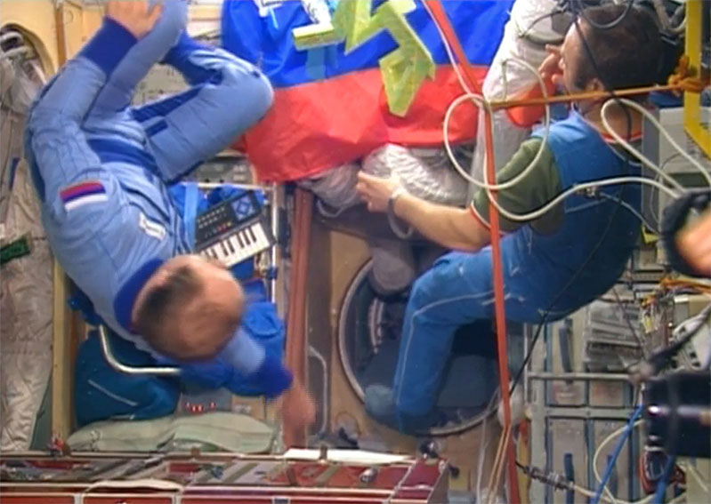 Cosmonauts Gennadi Manakov and Alexander Polischuk dancing 